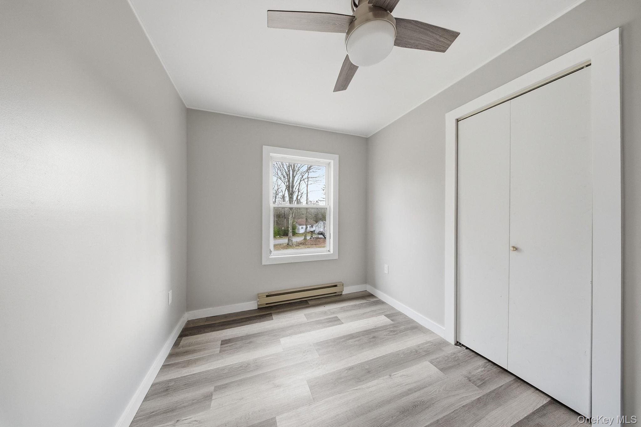 39 Dingle Daisy Road Monticello, NY 12701 - Photo 21 of 36 a view of an empty room with a window