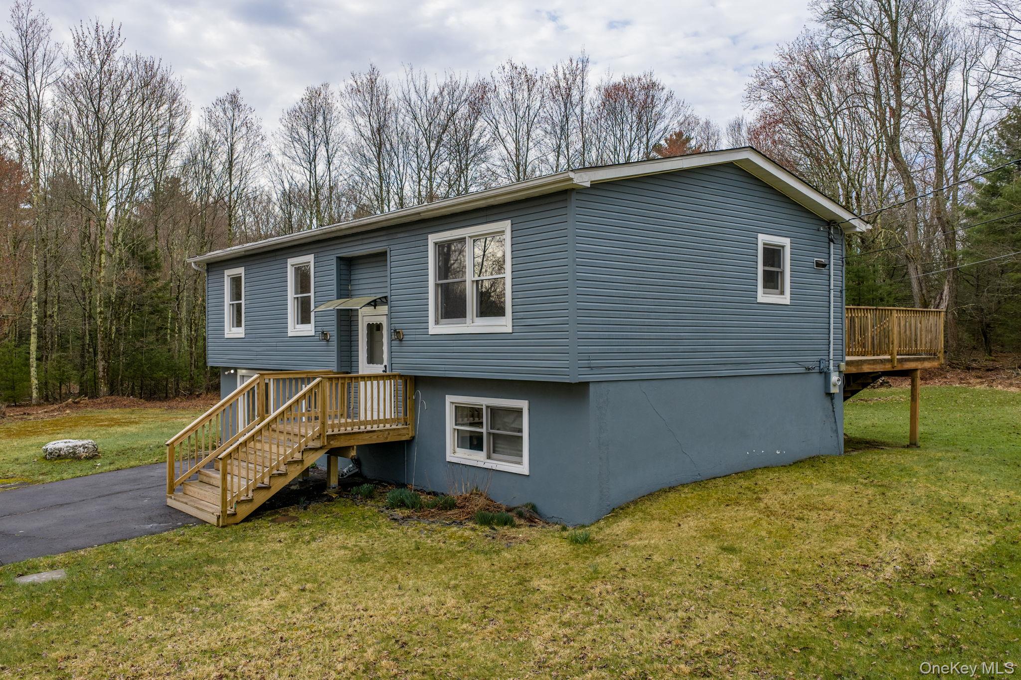 39 Dingle Daisy Road Monticello, NY 12701 - Photo 3 of 36 a view of a house with backyard