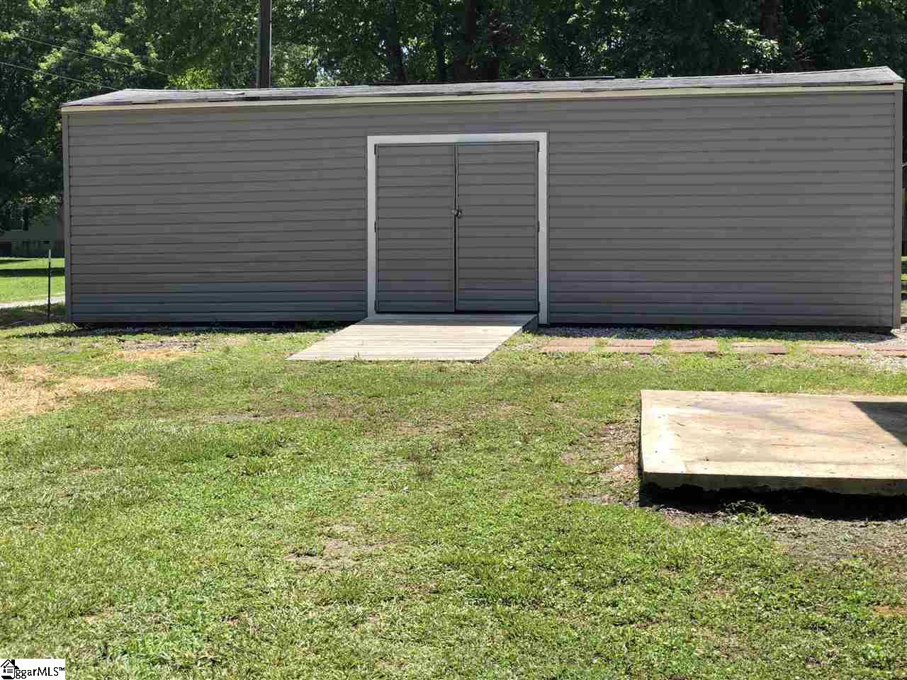271 New Circle Road Travelers Rest, SC 29690 - Photo 13 of 31 Storage shed with electric