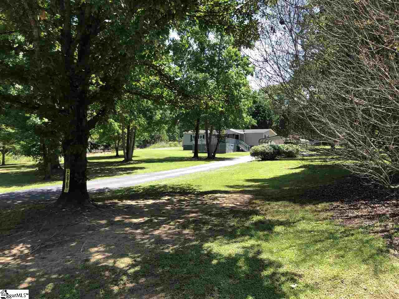 271 New Circle Road Travelers Rest, SC 29690 - Photo 3 of 31 Asphalt driveway