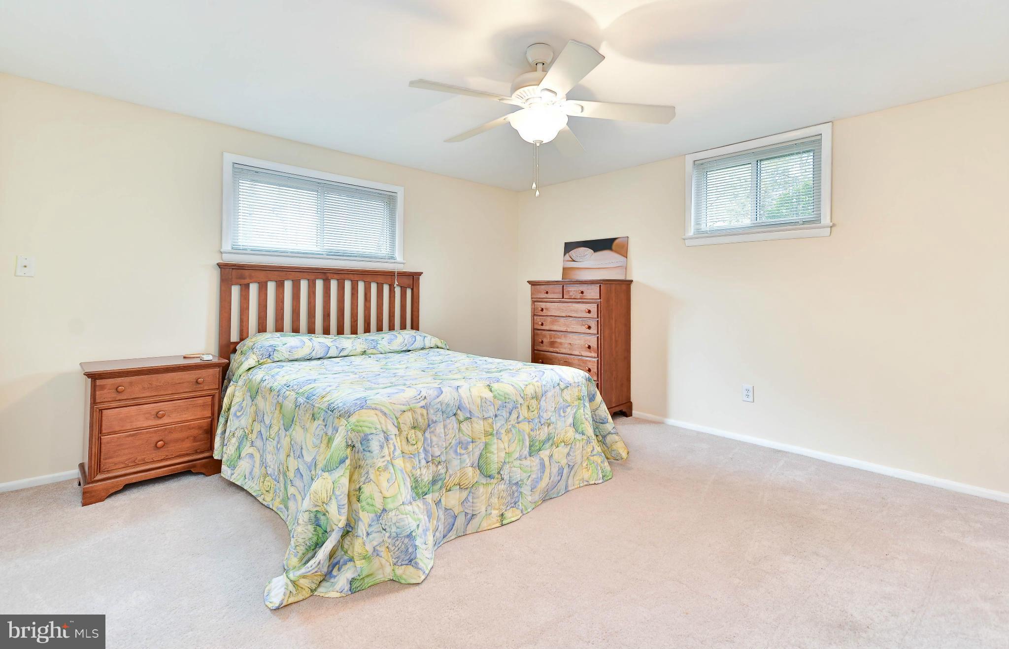 8504 Wagon Wheel Road Alexandria, VA 22309 - Photo 15 of 30 a bedroom with a bed and a window