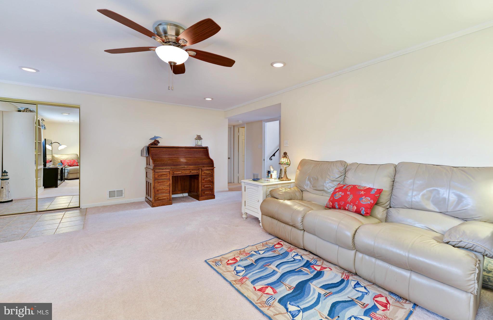 8504 Wagon Wheel Road Alexandria, VA 22309 - Photo 18 of 30 a living room with furniture and kitchen view