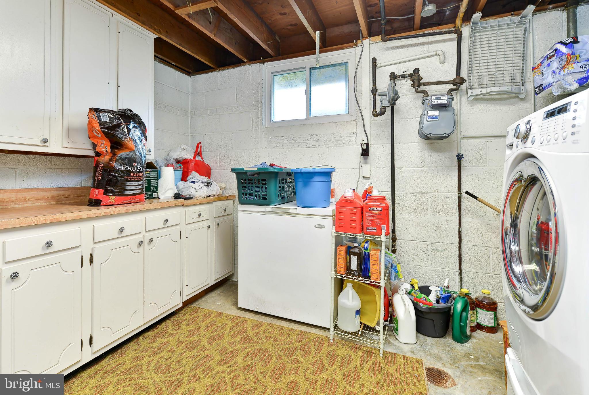 8504 Wagon Wheel Road Alexandria, VA 22309 - Photo 20 of 30 a utility room with sink dryer and washer