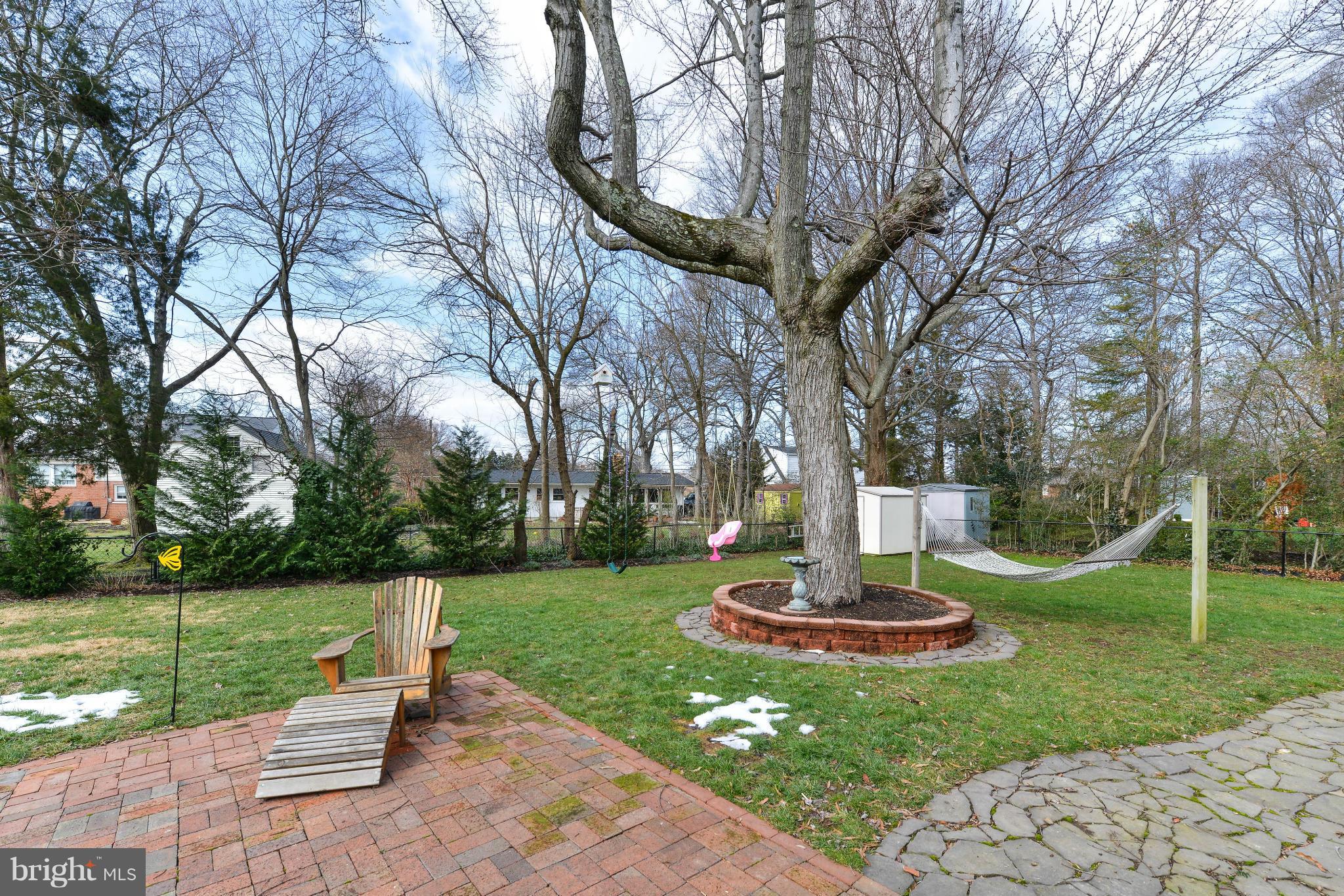 8504 Wagon Wheel Road Alexandria, VA 22309 - Photo 25 of 30 a view of a garden with a fountain