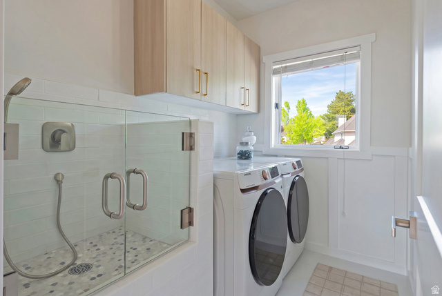 16 Gatehouse Lane Sandy, UT 84092 - Photo 33 of 73 Laundry room with wainscoting, dog wash, independent washer and dryer, and cabinet space