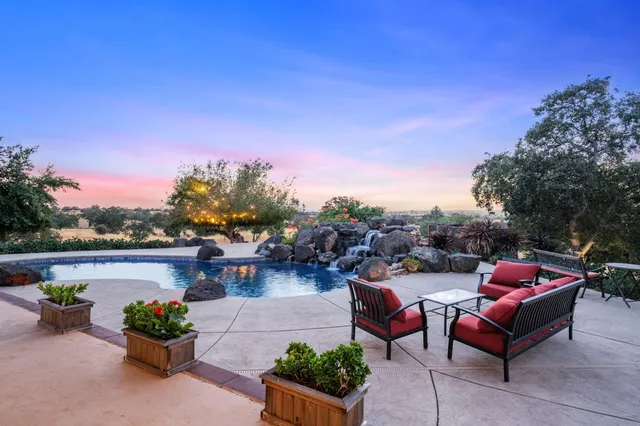 a view of a terrace with furniture