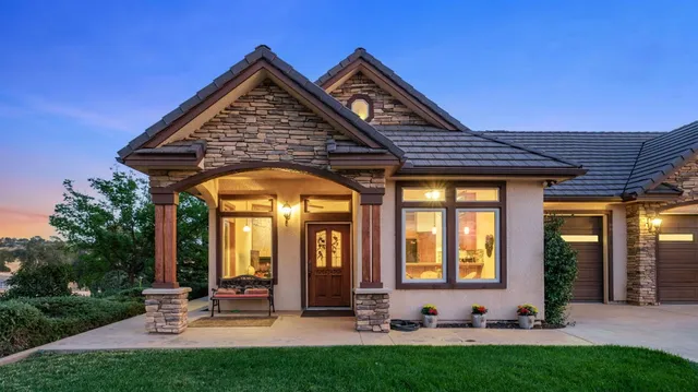 a view of house with yard outdoor seating area and barbeque oven