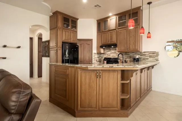 a bathroom with a sink a mirror and shower