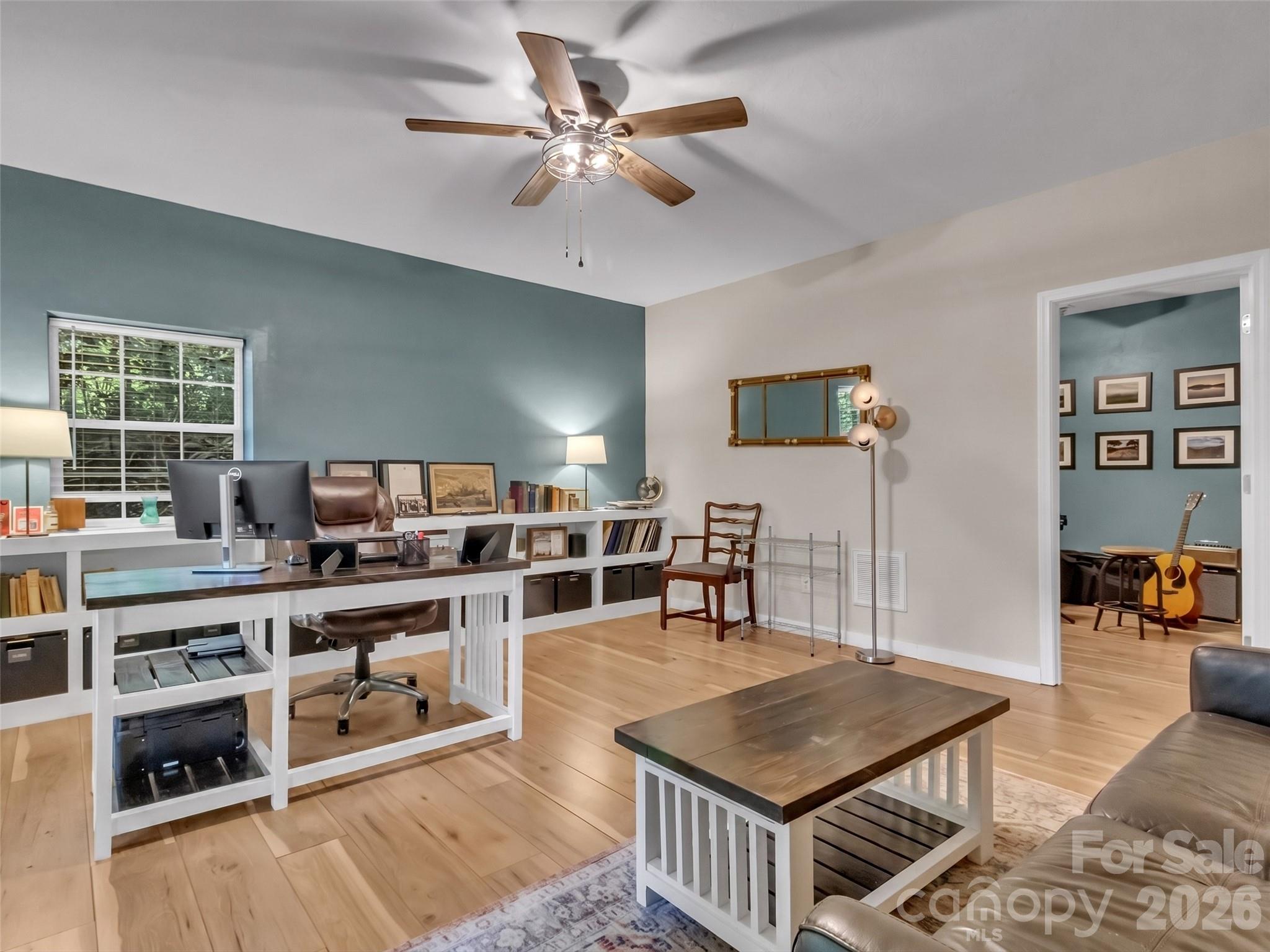 49 Brandywine Road Waynesville, NC 28786 - Photo 25 of 38 a living room with stainless steel appliances kitchen island granite countertop furniture and a kitchen view
