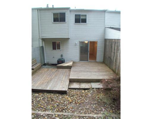 299 McKee Road North Versailles, PA 15137 - Photo 14 of 18 Exterior Front. Rear of home w/ deck and backyard.