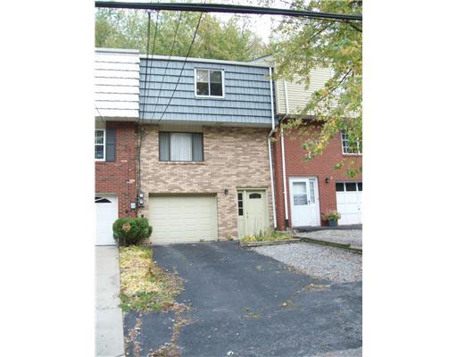 299 McKee Road North Versailles, PA 15137 - Photo 15 of 18 Exterior Front. Enough parking for 3-4 vehicles and very little lawncare needed ;)