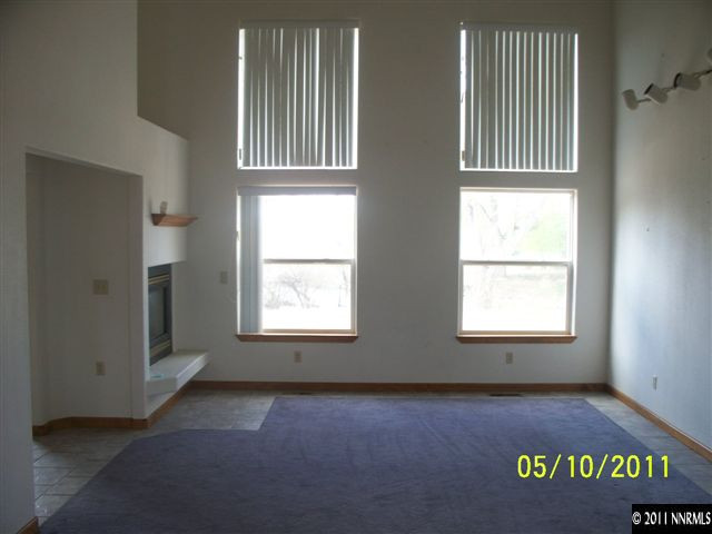 1131 Rice Road Fallon, NV 89406 - Photo 4 of 13 an empty room with windows
