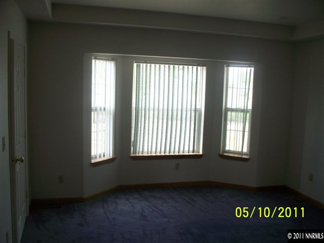1131 Rice Road Fallon, NV 89406 - Photo 8 of 13 a view of an empty room with a window
