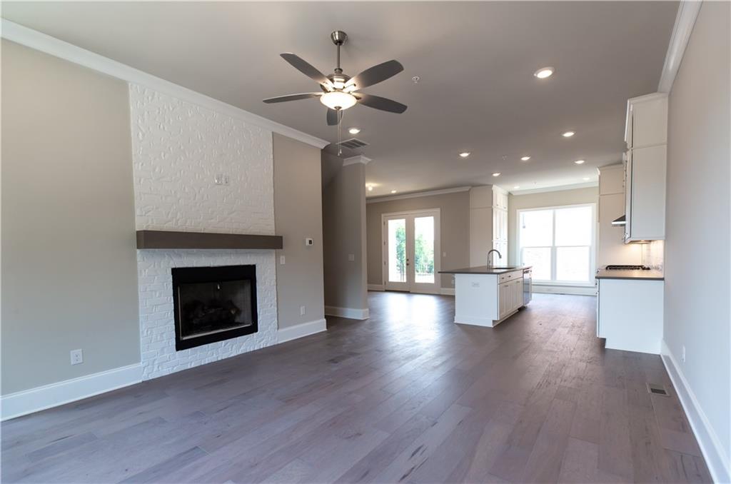 1196 Farmstead Road, Unit 79 Suwanee, GA 30024 - Photo 1 of 1 Family Room to kitchen