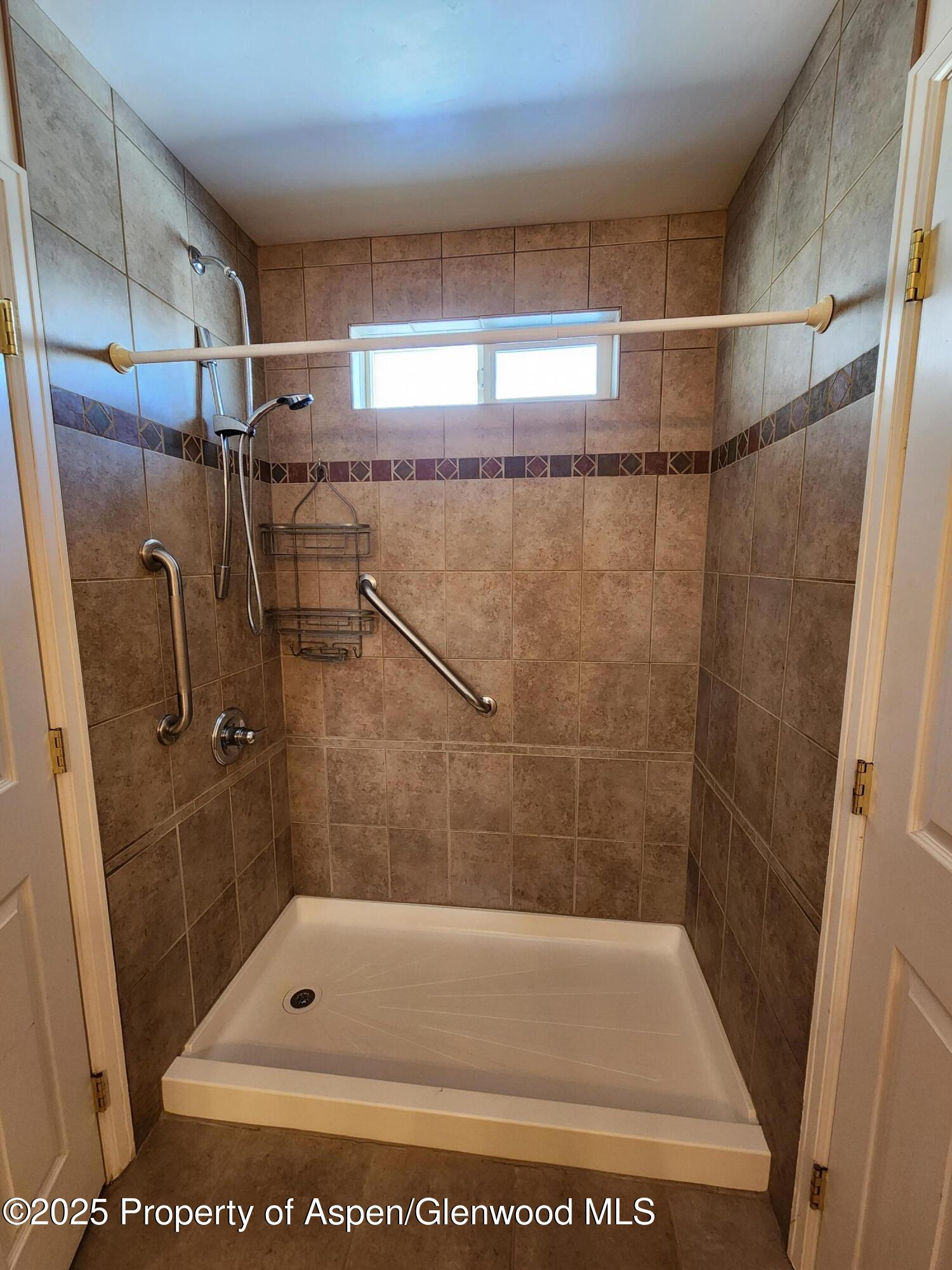 1695 Arabian Avenue Rifle, CO 81650 - Photo 14 of 20 a bathroom with a shower