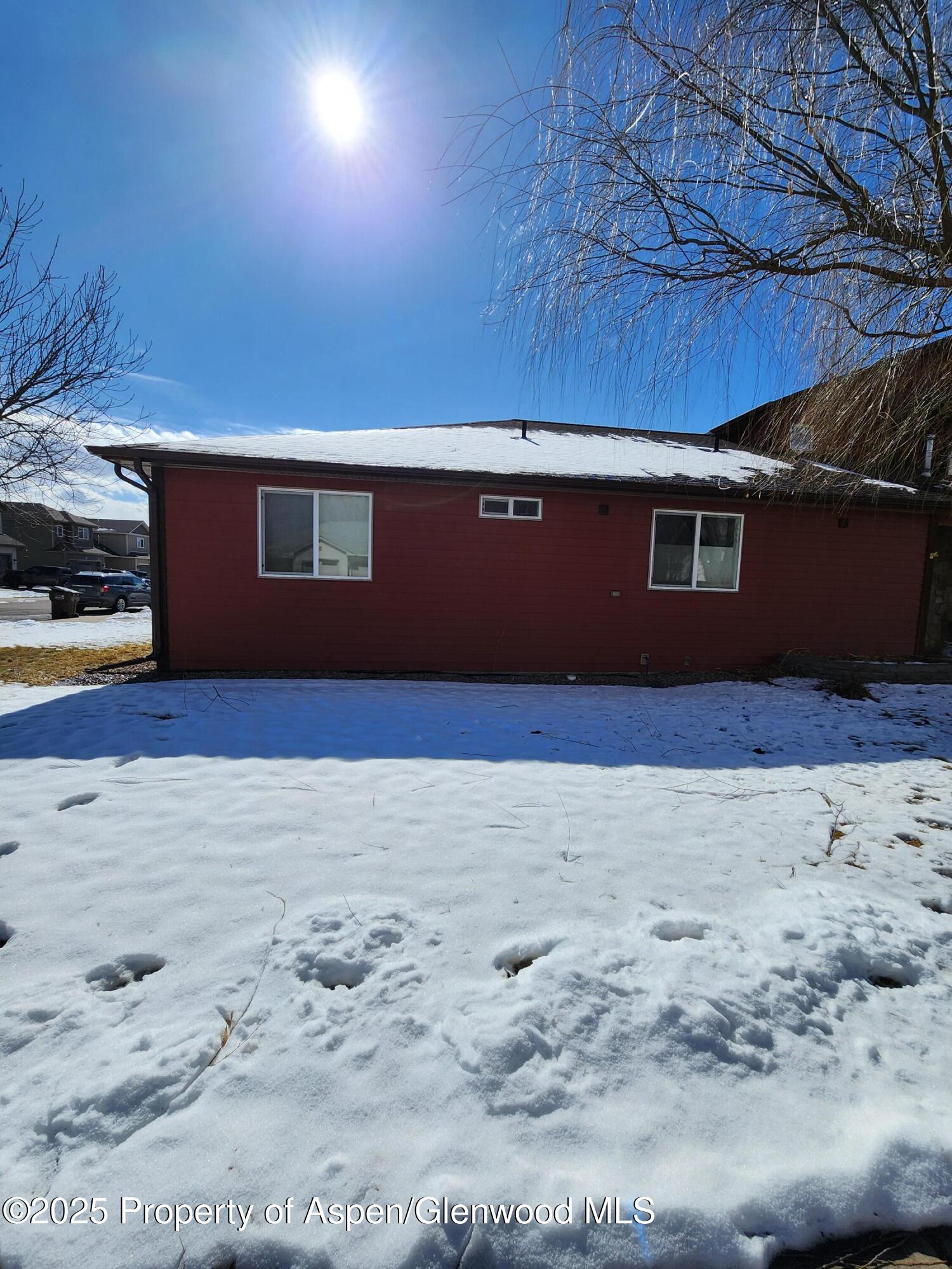1695 Arabian Avenue Rifle, CO 81650 - Photo 3 of 20 a view of backyard with wooden floor