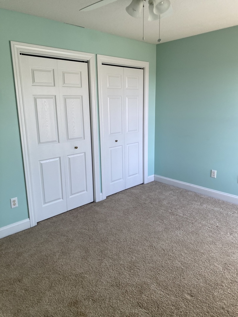 1835 Marina Drive Normal, IL 61761 - Photo 18 of 22 a view of an empty room and closet area