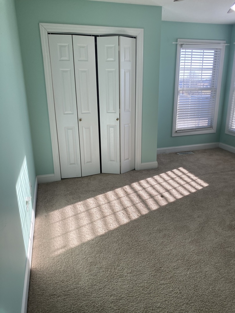 1835 Marina Drive Normal, IL 61761 - Photo 21 of 22 a view of an empty room with a window