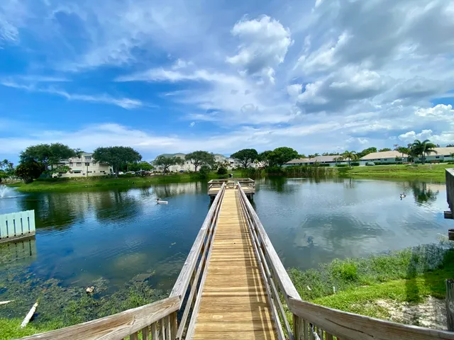 a view of a lake with a city from a lake