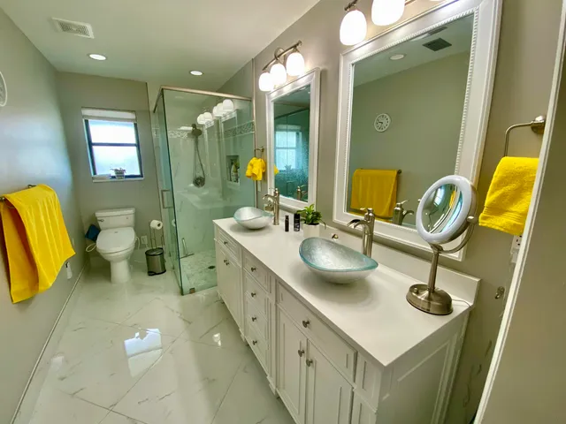 a bathroom with a sink and mirror