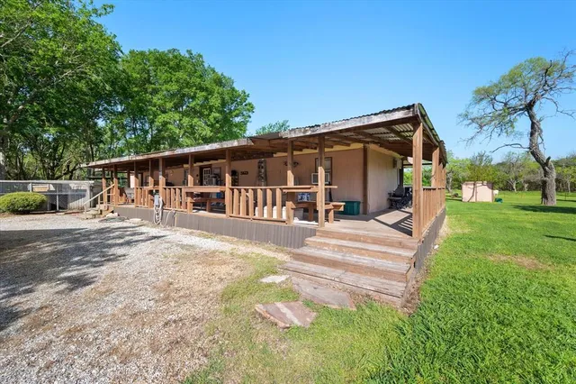 front view of a house with a small yard