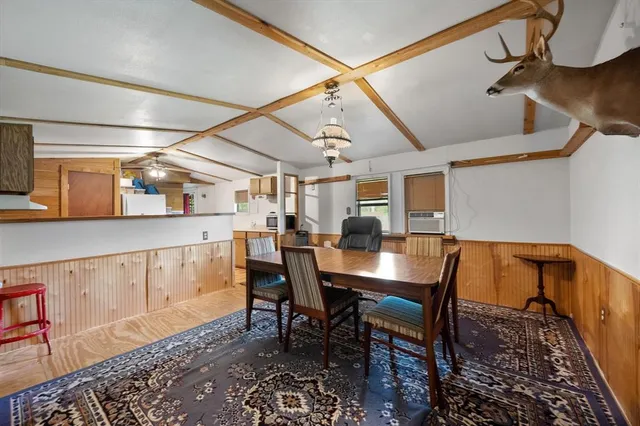 a view of a dining room with furniture