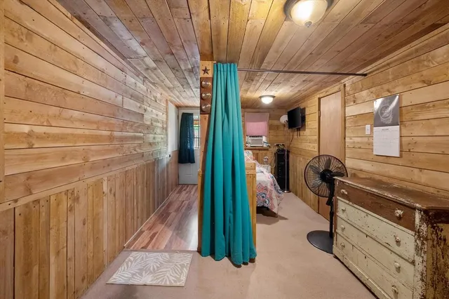 a kitchen with a sink and a refrigerator