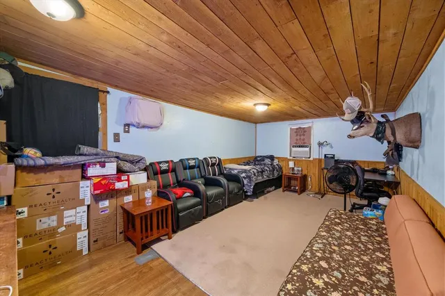 a view of a kitchen with refrigerator and stove