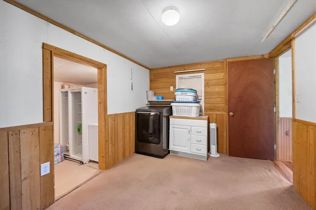 a view of a livingroom with natural light