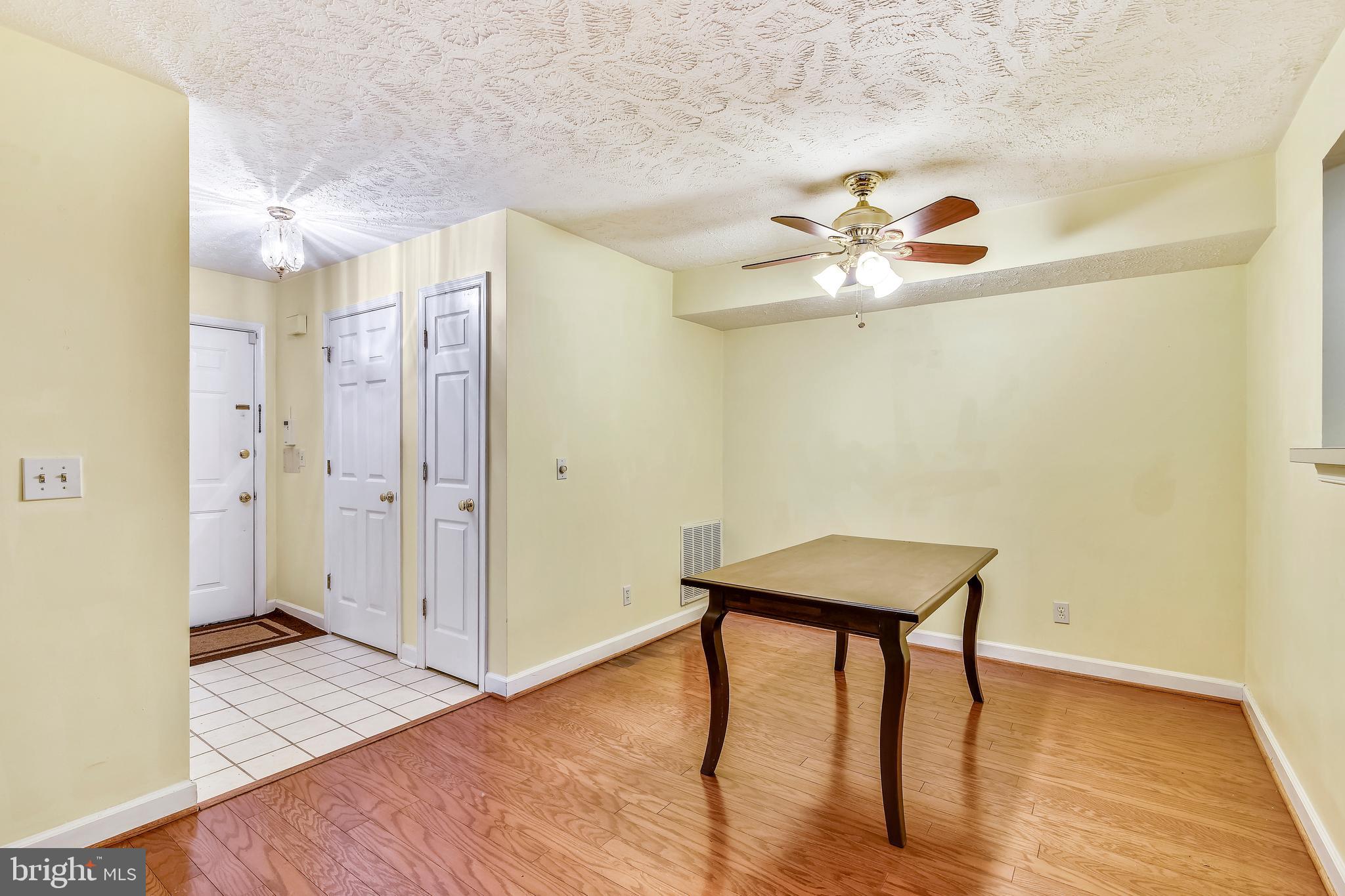 12002 Ridge Knoll Drive, Unit 7 Fairfax, VA 22033 - Photo 17 of 42 Dining Room and Foyer.