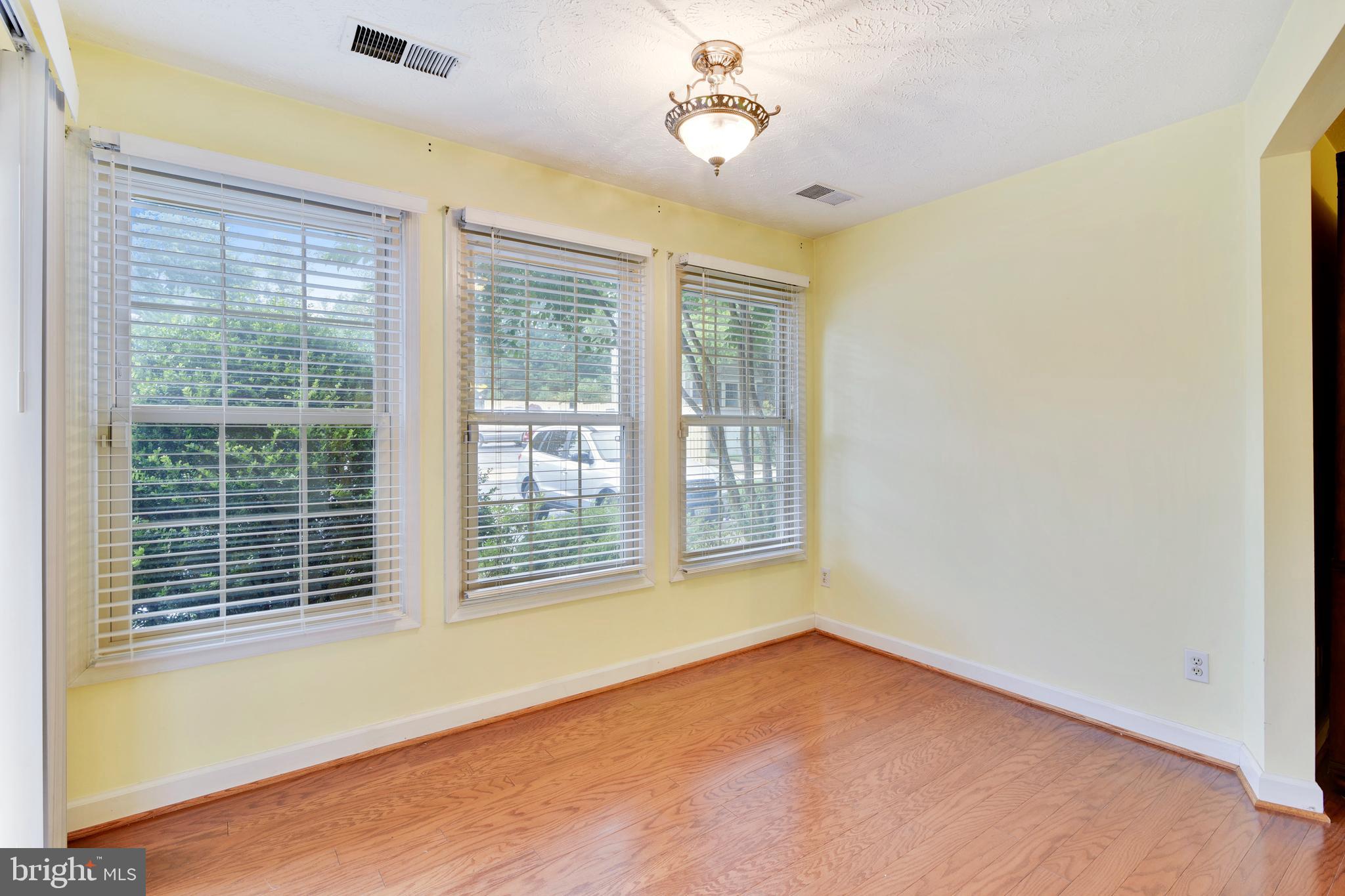12002 Ridge Knoll Drive, Unit 7 Fairfax, VA 22033 - Photo 20 of 42 Sunroom