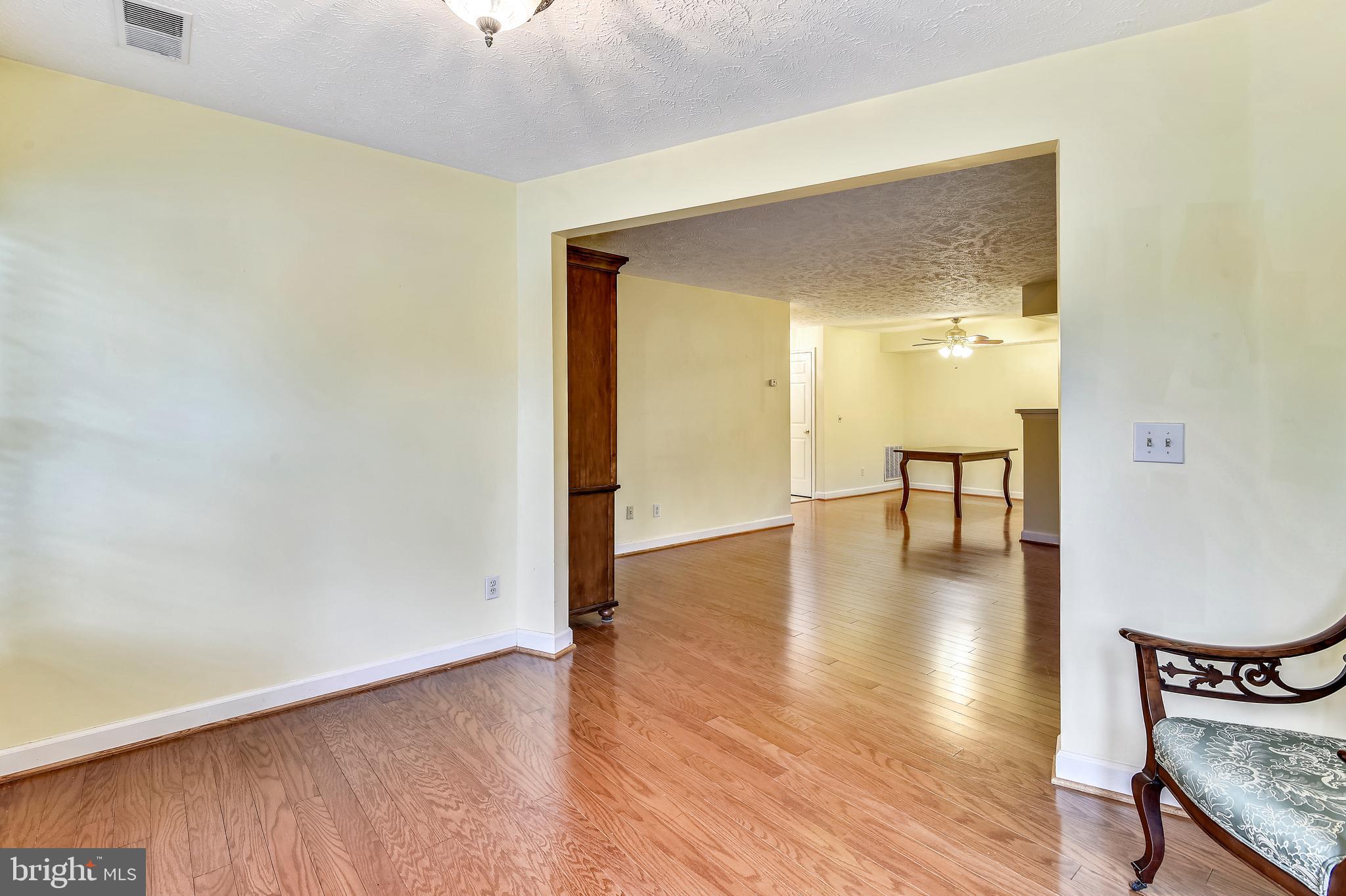 12002 Ridge Knoll Drive, Unit 7 Fairfax, VA 22033 - Photo 21 of 42 Sunroom & Living Room