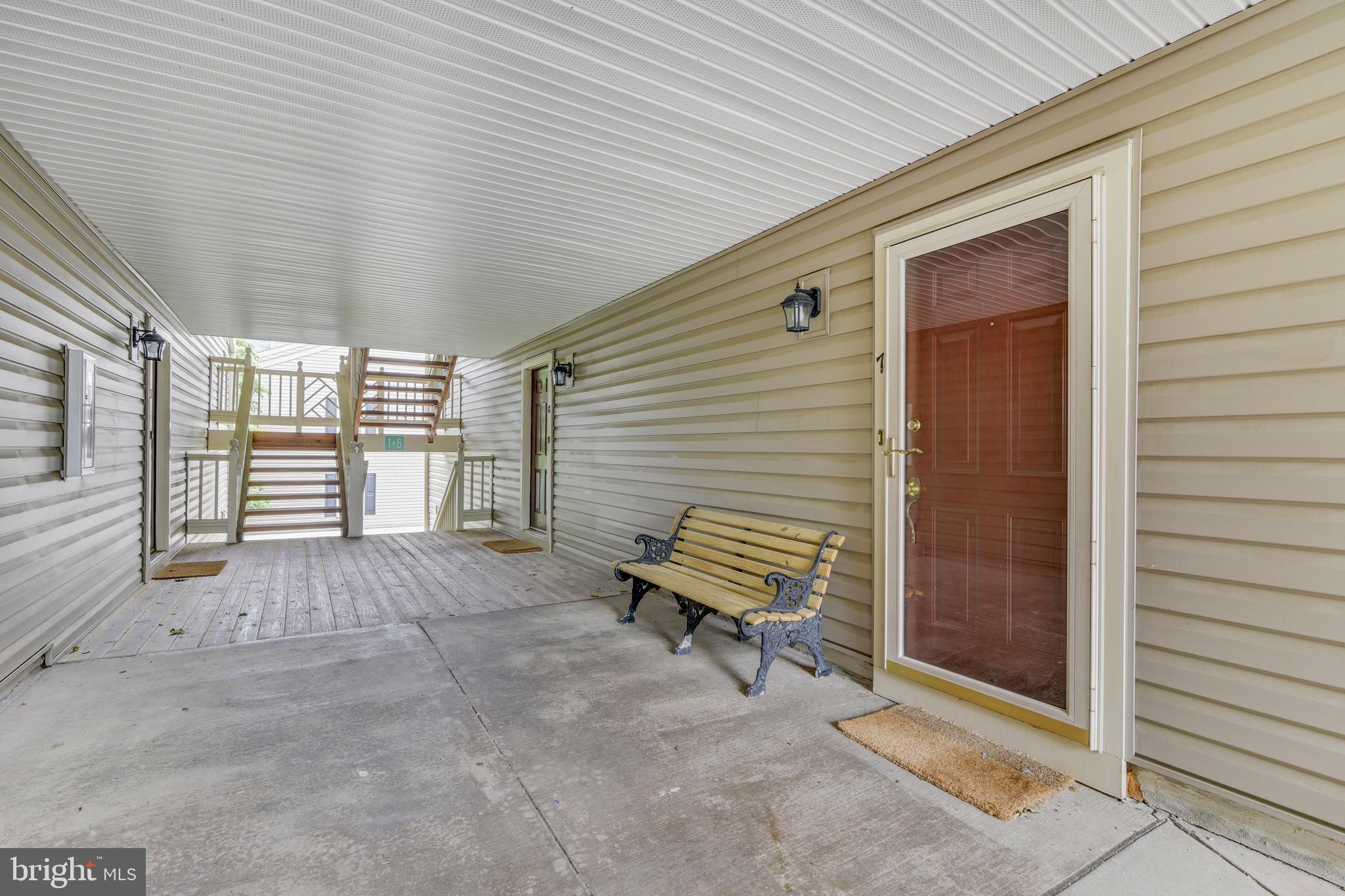 12002 Ridge Knoll Drive, Unit 7 Fairfax, VA 22033 - Photo 25 of 42 Building Breezeway and Front Door