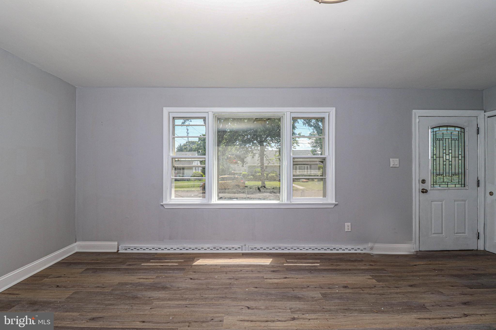 19 Sheldon Road Pemberton, NJ 08068 - Photo 18 of 30 a view of an empty room with wooden floor and a window