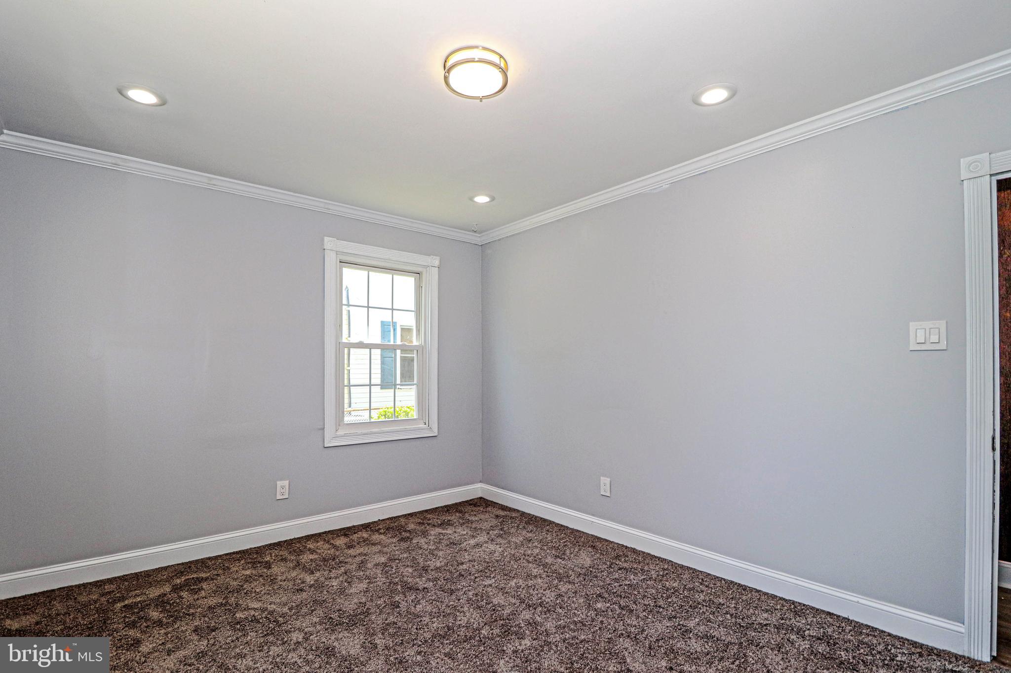 19 Sheldon Road Pemberton, NJ 08068 - Photo 21 of 30 an empty room with a window
