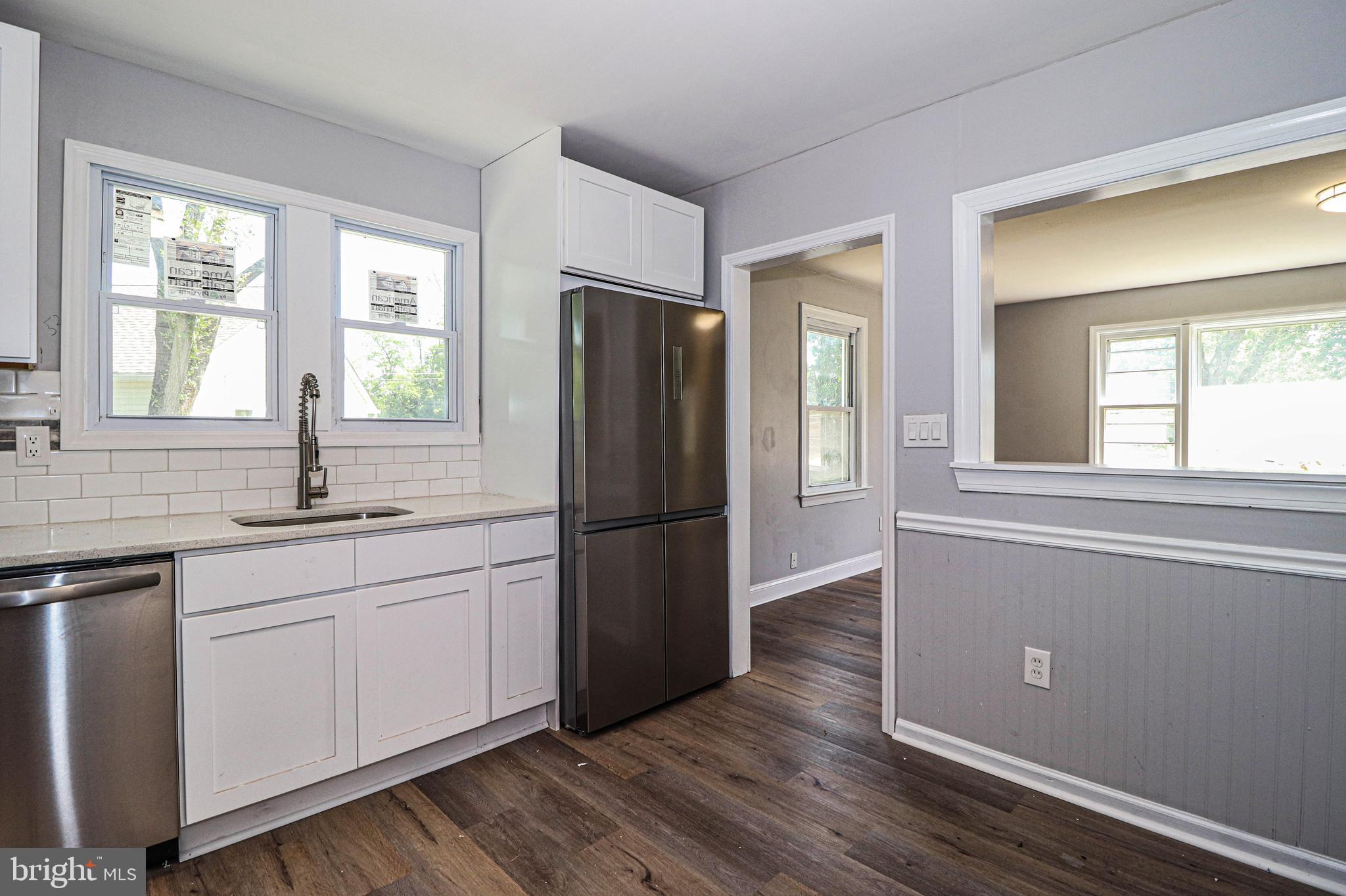 19 Sheldon Road Pemberton, NJ 08068 - Photo 6 of 30 a kitchen with a refrigerator and windows