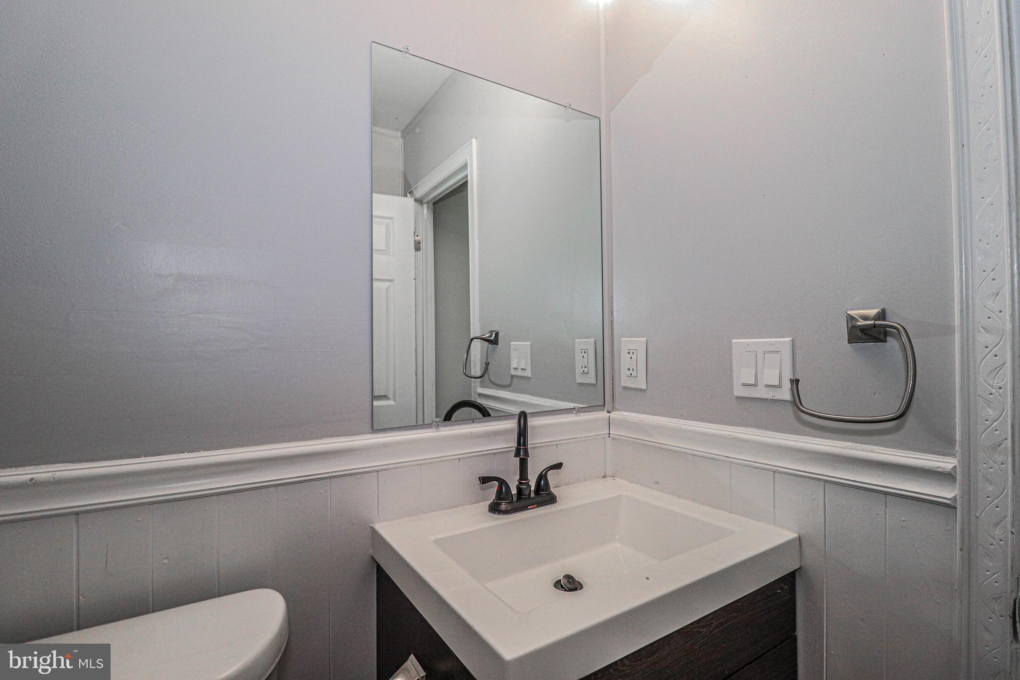 19 Sheldon Road Pemberton, NJ 08068 - Photo 9 of 30 a bathroom with a sink toilet and mirror