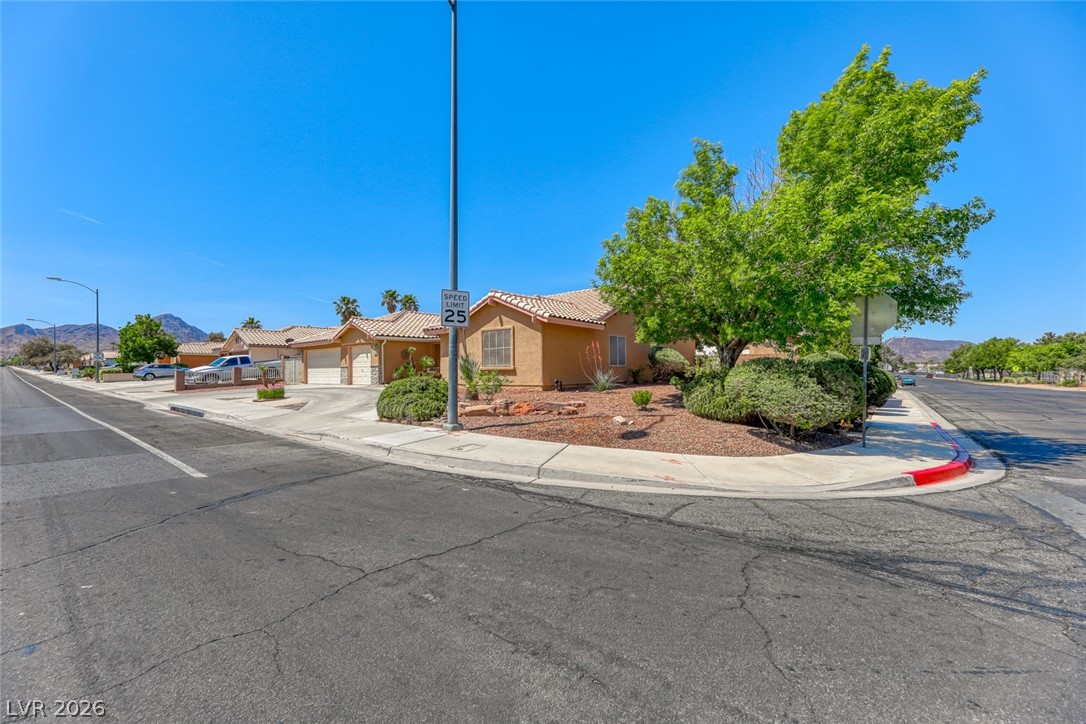 2001 Appaloosa Road Henderson, NV 89002 - Photo 41 of 44 This charming residence offers a welcoming exterior with classic architectural elements and a well-maintained landscape.