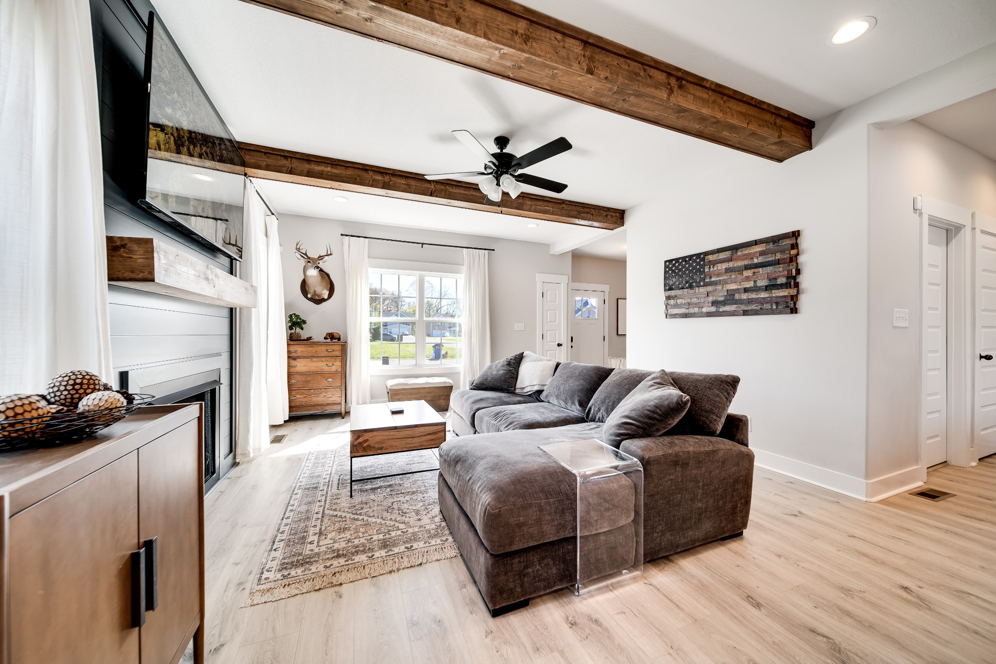 3052 Core Drive Clarksville, TN 37040 - Photo 16 of 53 a living room with furniture and a flat screen tv