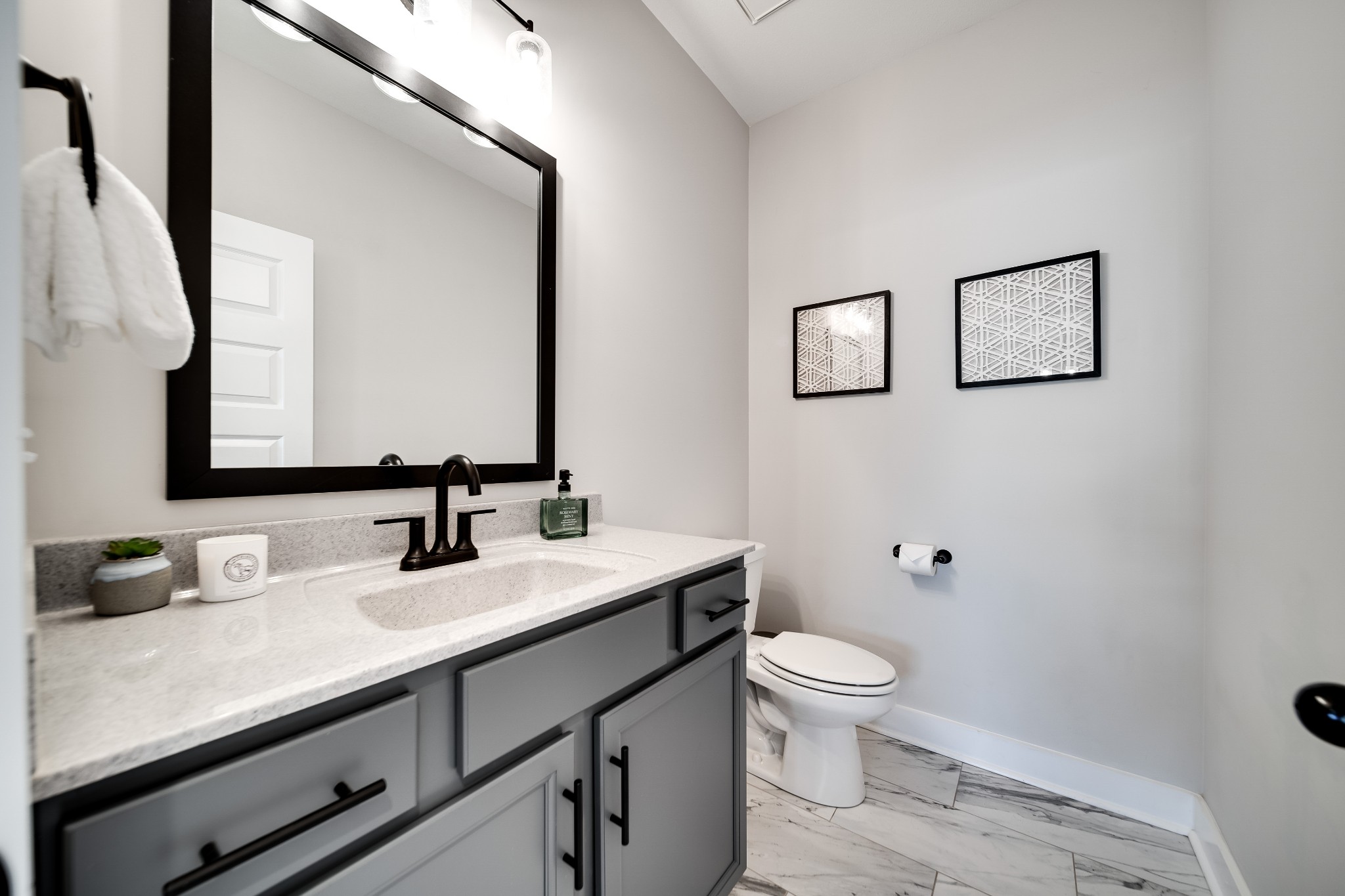 3052 Core Drive Clarksville, TN 37040 - Photo 40 of 53 a bathroom with a sink a toilet and mirror
