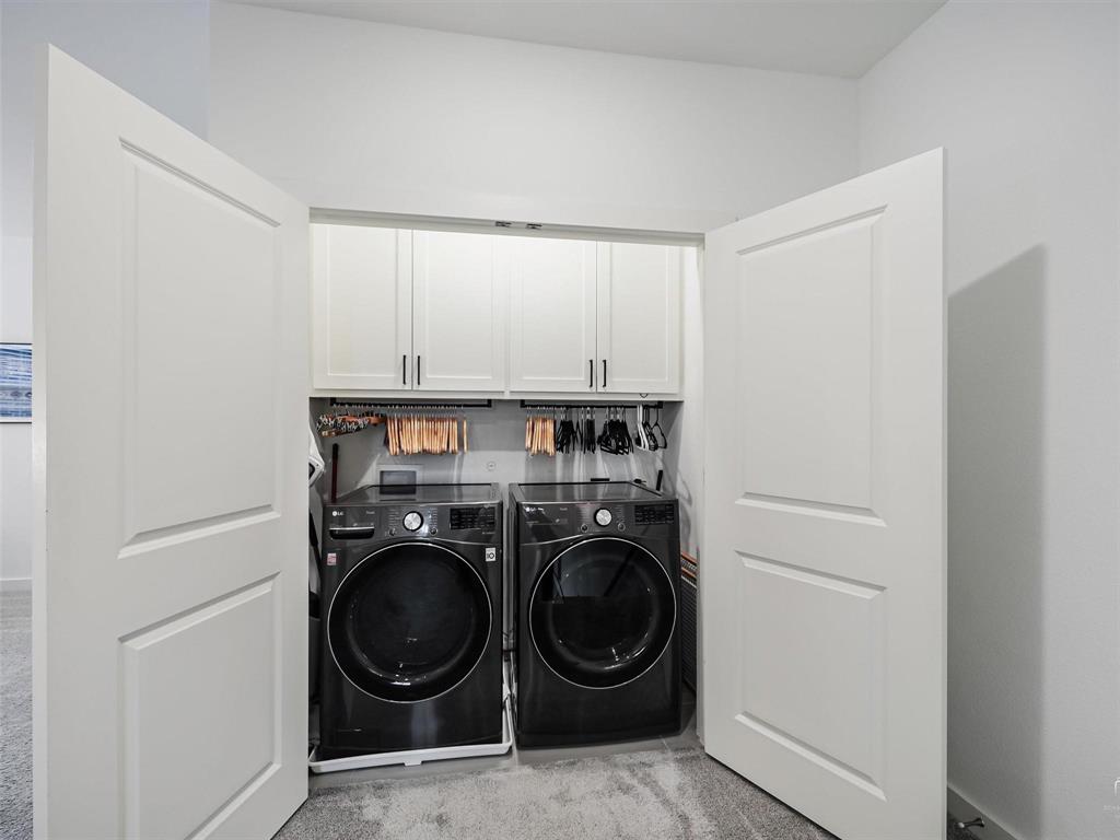 5912 Ridgeline Drive McKinney, TX 75070 - Photo 17 of 22 a utility room with dryer and washer
