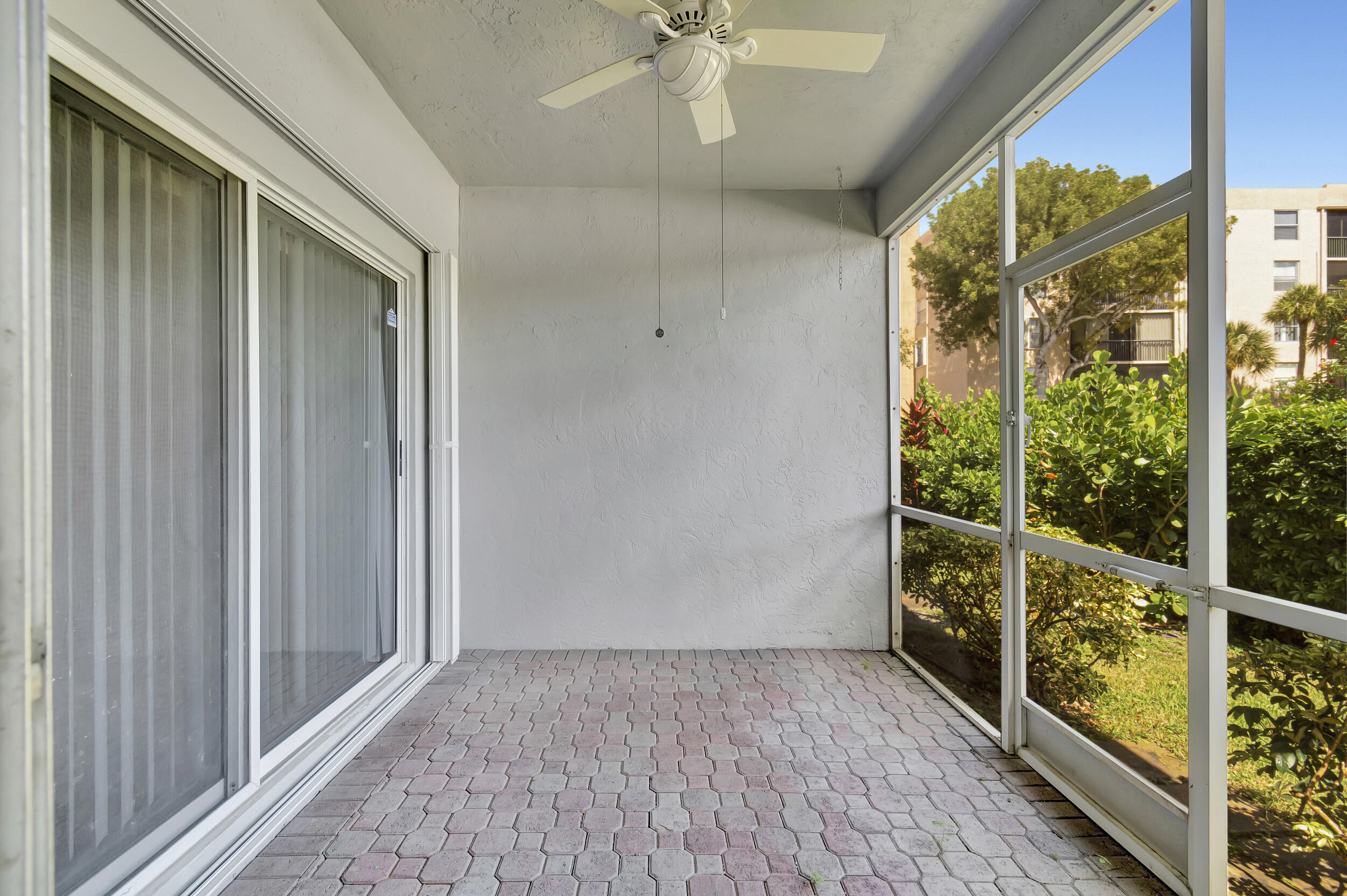 5190 Sabal Gardens Lane, Unit 3 Boca Raton, FL 33487 - Photo 24 of 29 screen in porch