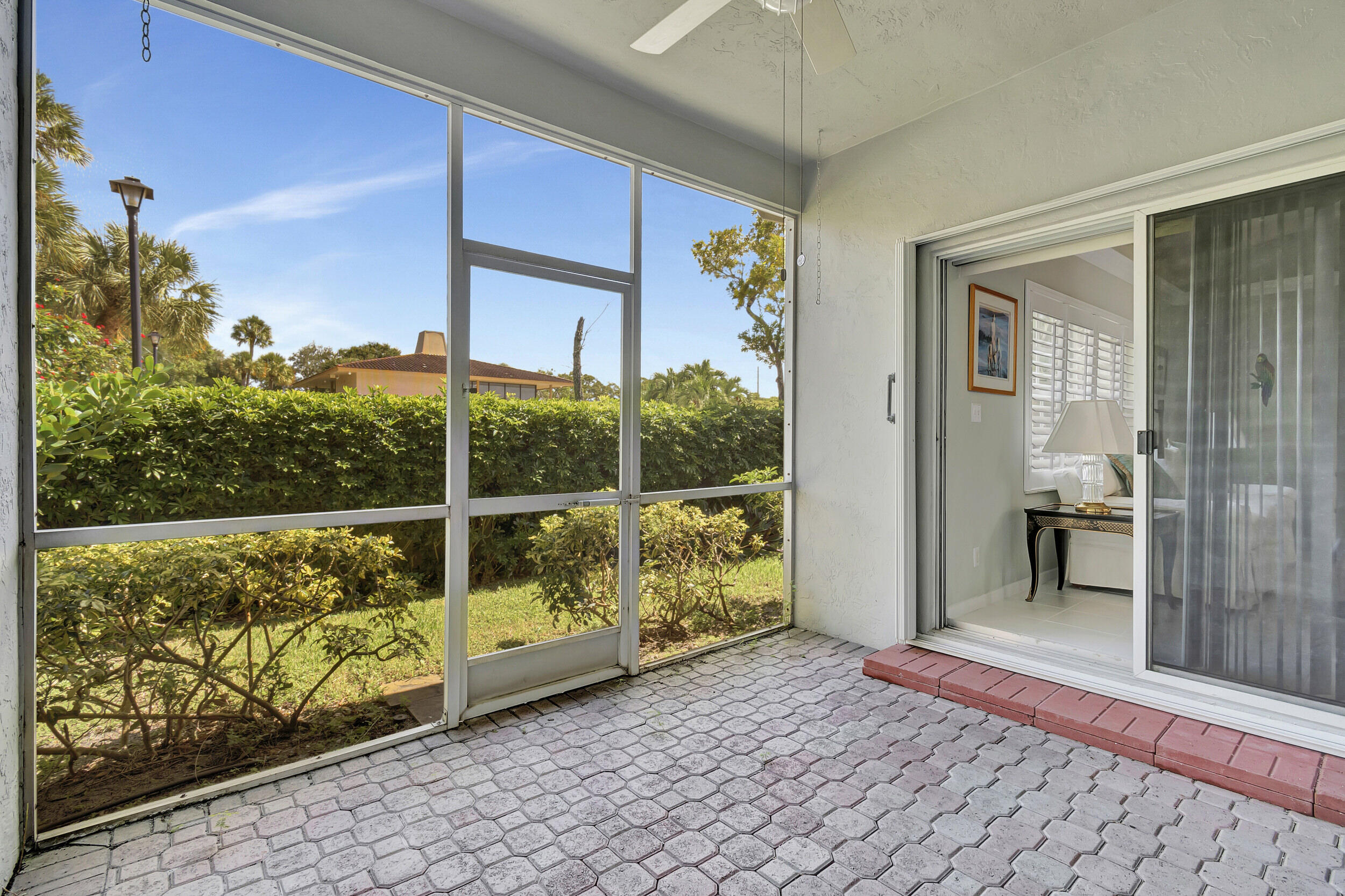 5190 Sabal Gardens Lane, Unit 3 Boca Raton, FL 33487 - Photo 25 of 29 screened in porch