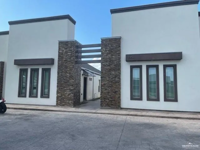 a house view with a outdoor space