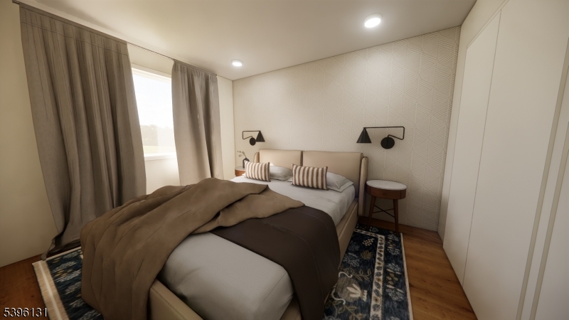 39 Ledgewood Avenue Netcong, NJ 07857 - Photo 4 of 9 a bedroom with a bed and a window