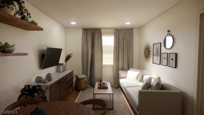 39 Ledgewood Avenue Netcong, NJ 07857 - Photo 9 of 9 a living room with furniture and a flat screen tv