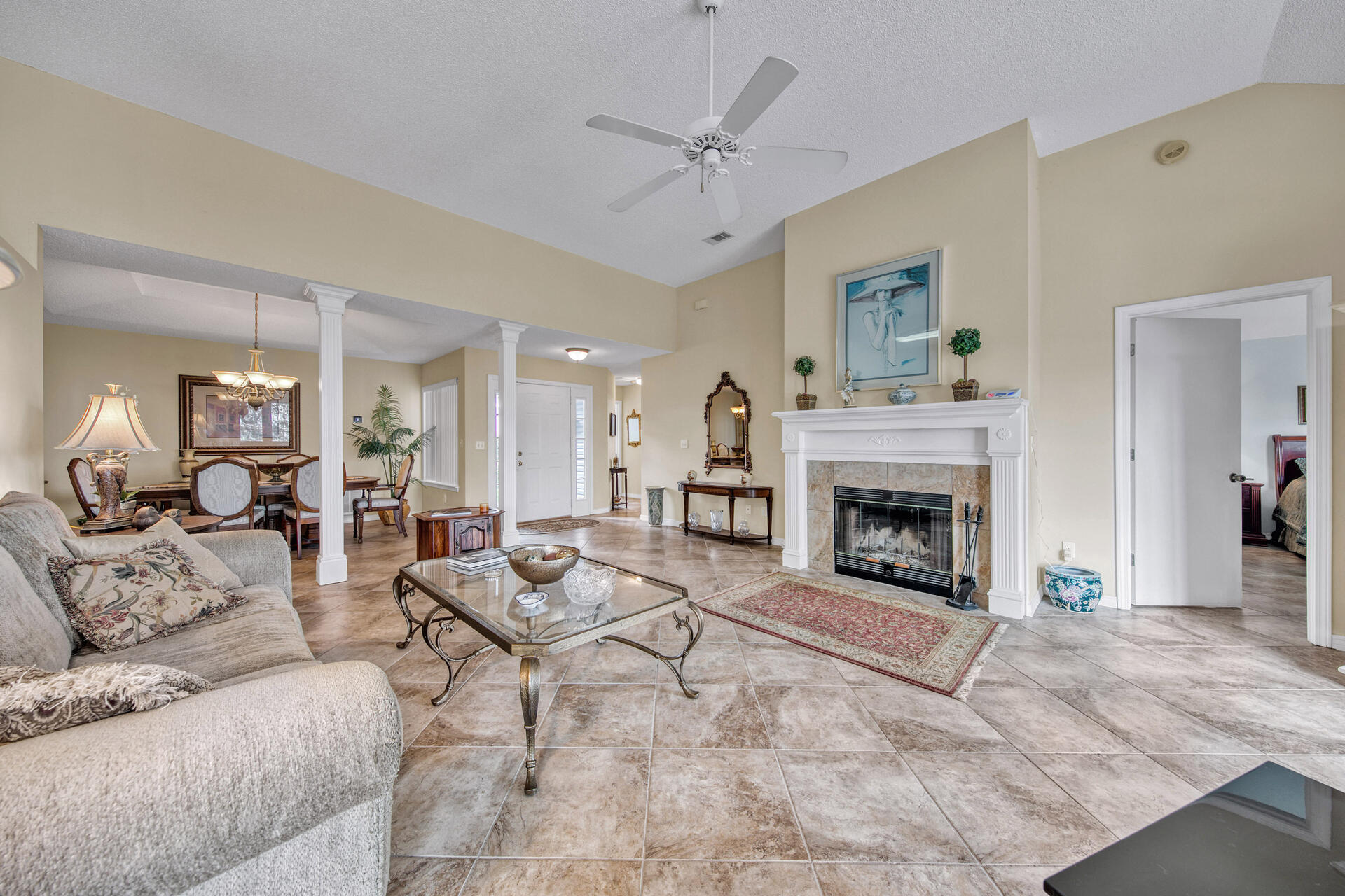 3789 Misty Way Destin, FL 32541 - Photo 13 of 29 a living room with furniture and a fireplace