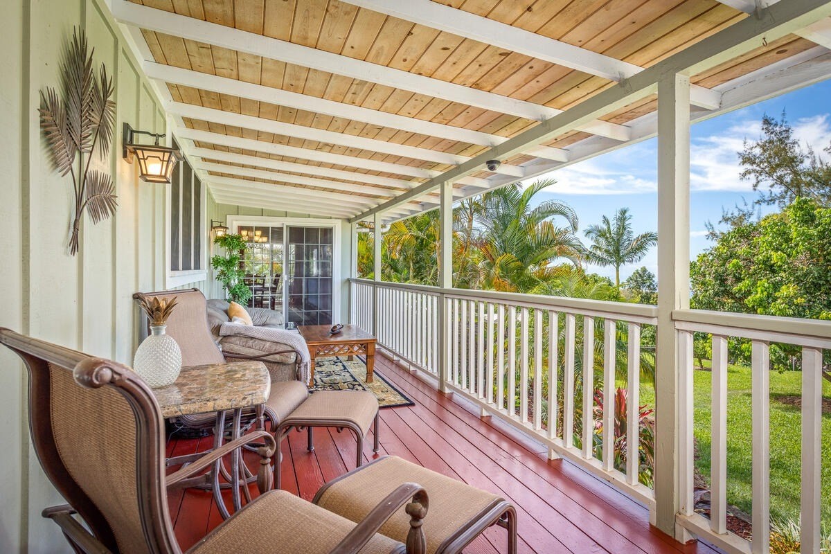 81-1073-i Captain Cook Road Captain Cook, HI 96704 - Photo 10 of 25 a balcony view with couple of chairs and wooden floor