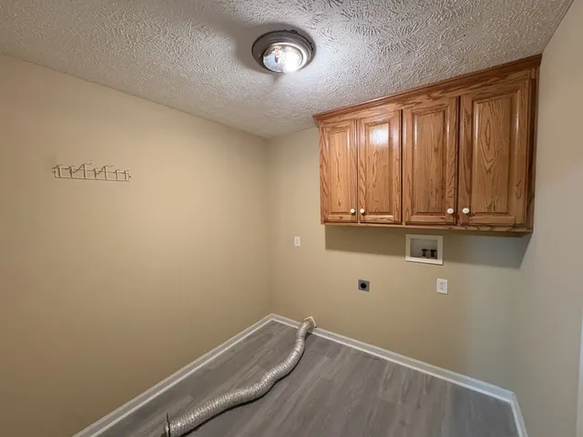 a view of a room with rack on the wall