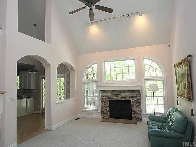 2308 Primrose Valley Court Raleigh, NC 27613 - Photo 5 of 12 The spacious family room features a 2 story ceiling, gorgeous windows, and a gas log fireplace with stacked stone surround. Other